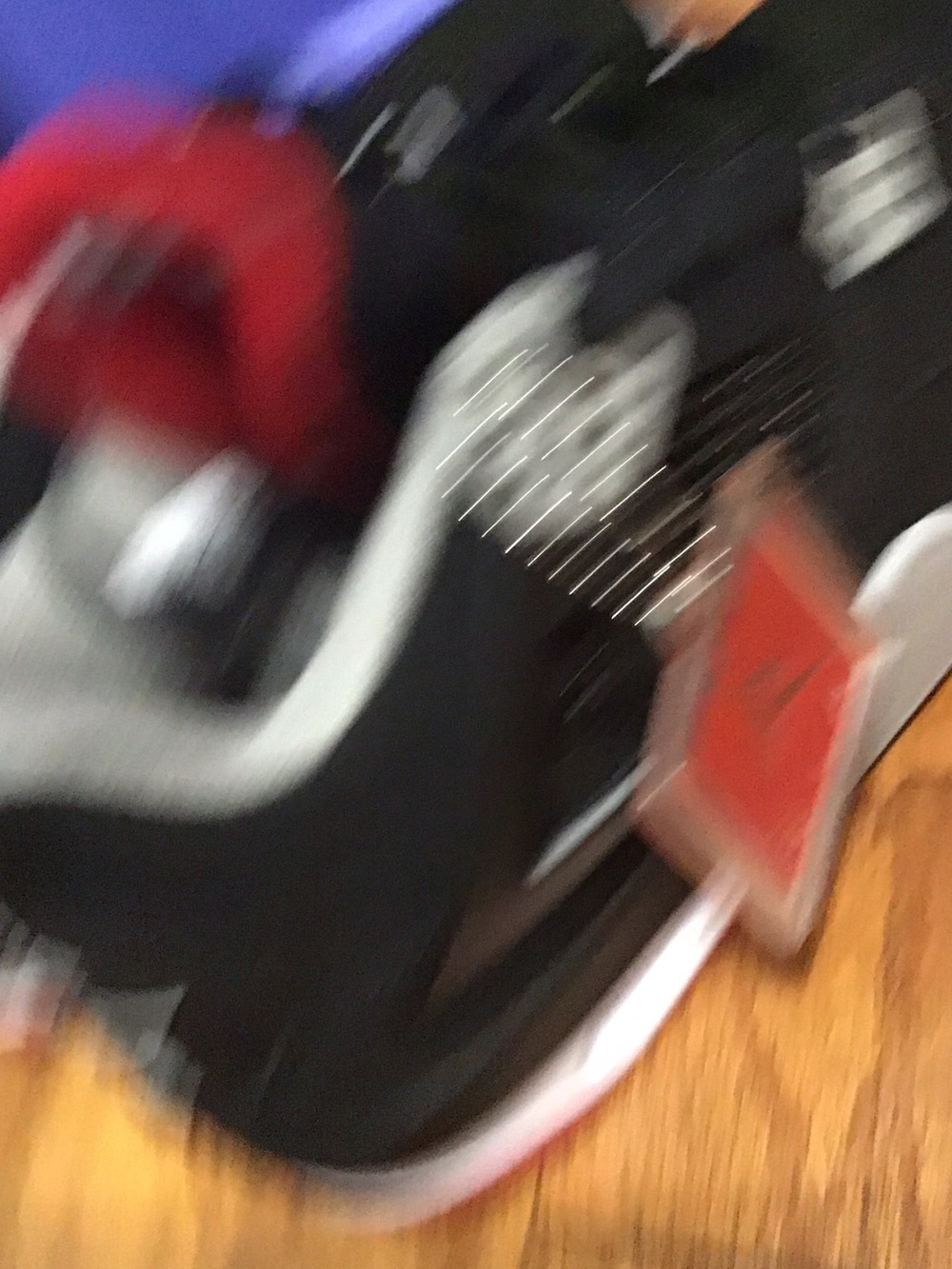 Jordan Black and Red Retro Basketball Sneakers - Picture 3 of 5